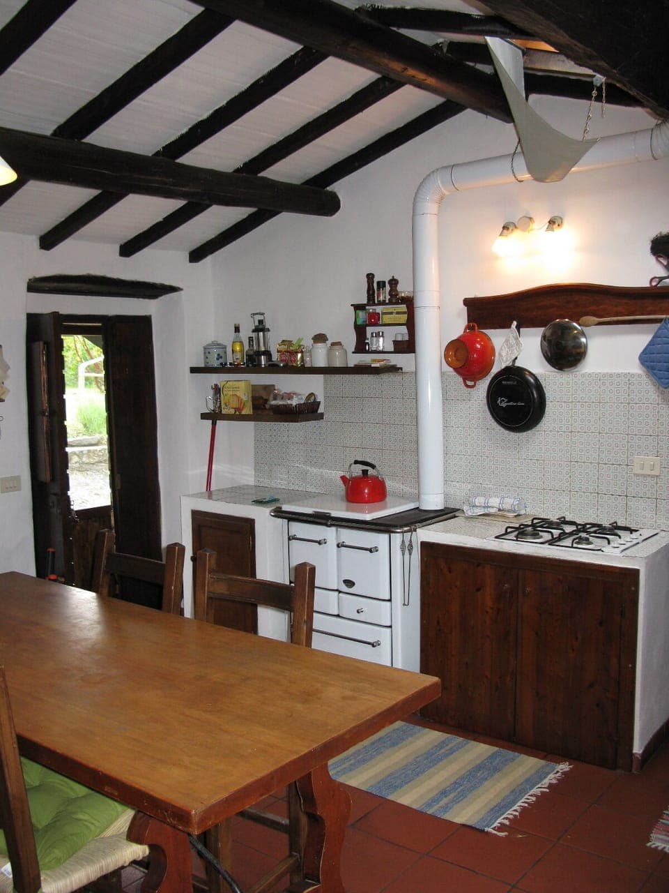 In the kitchen you can also cook on the wooden stove 