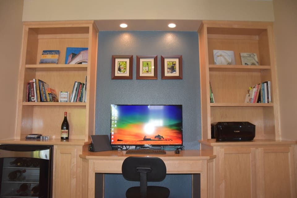 Built in business center with with all in one printer, 43” monitor, wifi 