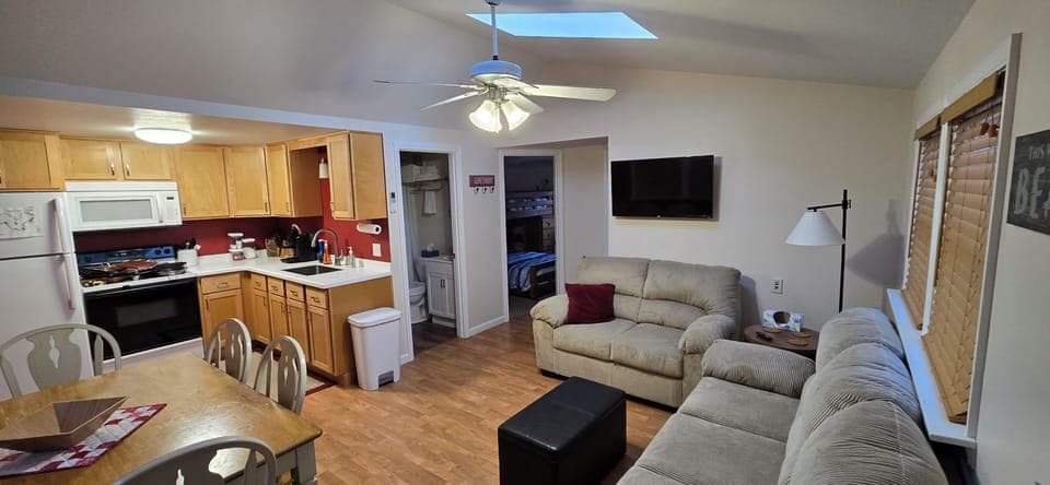 Living room, dining, and kitchen