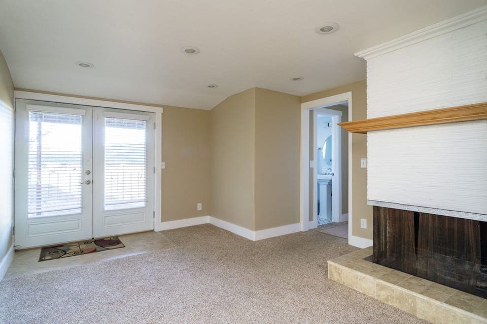 Garden level living room has a daybed with pull out trundle