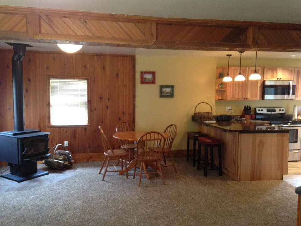 Cozy fireplace, and large peninsula for cooking, eating, playing games/puzzles.
