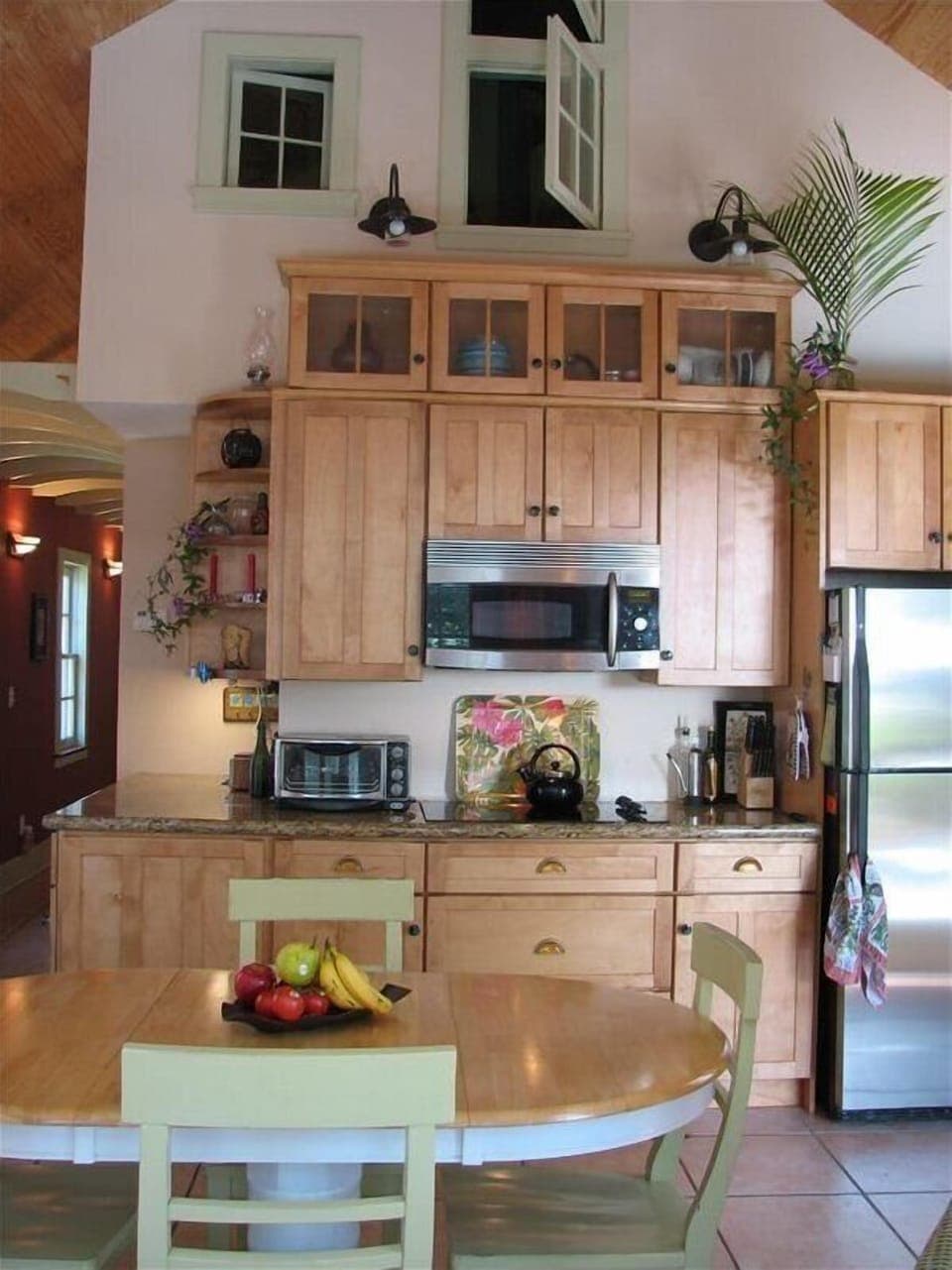 High ceilings in the 2 living rooms! Here's part of the kitchen/dining