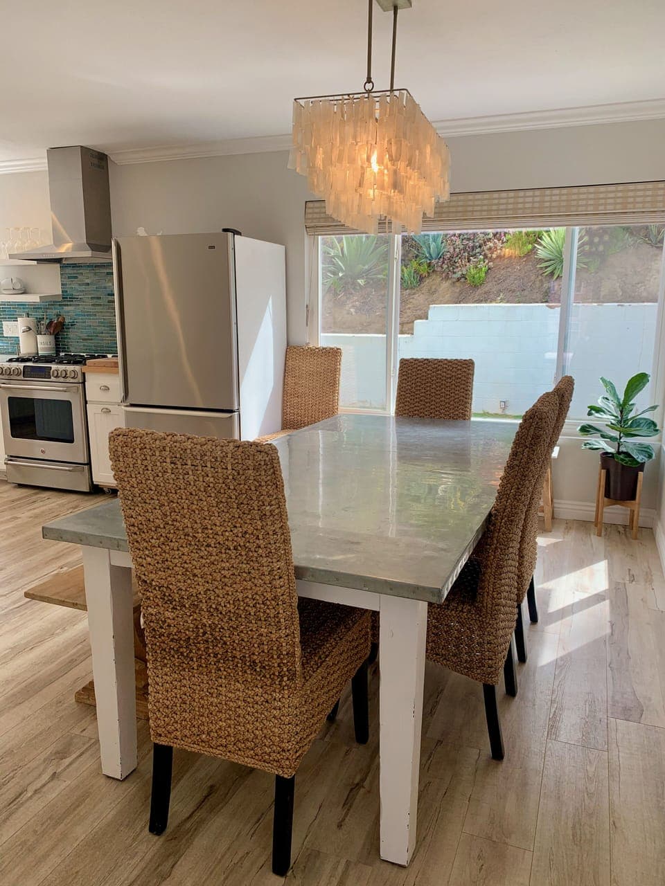 Dining table with zinc top and seating for 8 people