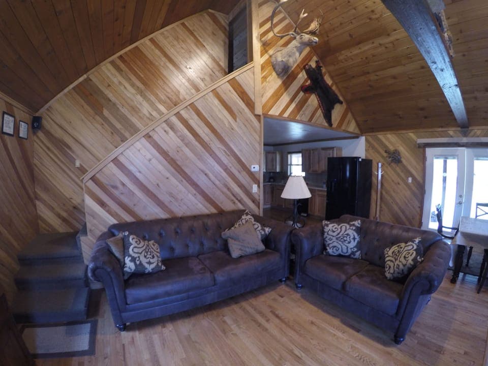 The living room has plenty of seating for your entire party