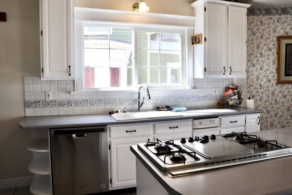 Full Kitchen, Island, and Dining Table