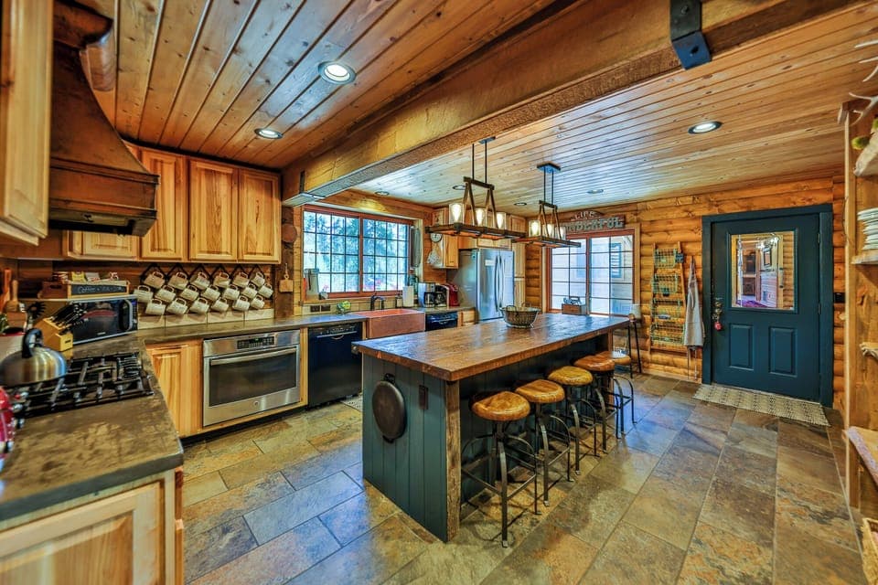 Main kitchen, north wing. Large gas stove, 2 ovens, 2 dishwashers, 2 refrigerators 