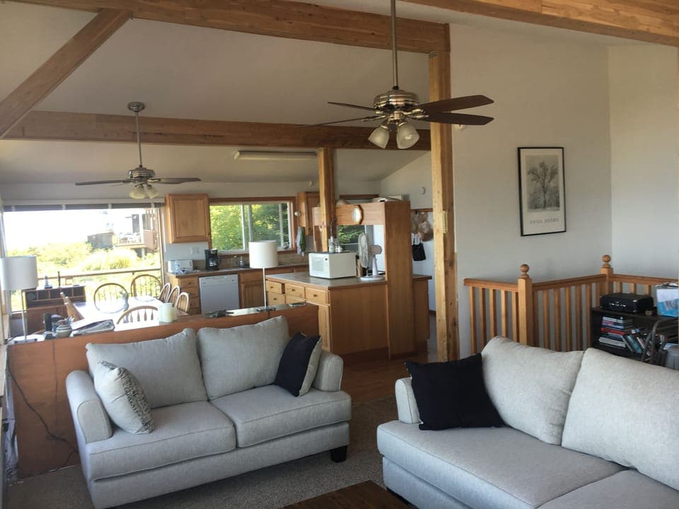 Living room looking into the dining room and kitchen