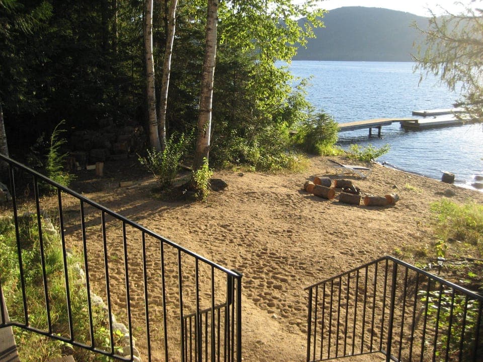 Step onto the beach from the front steps