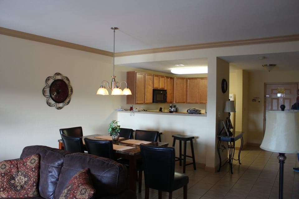 Open Dining space with seating for 6 with 3 barstools at the Kitchen bar