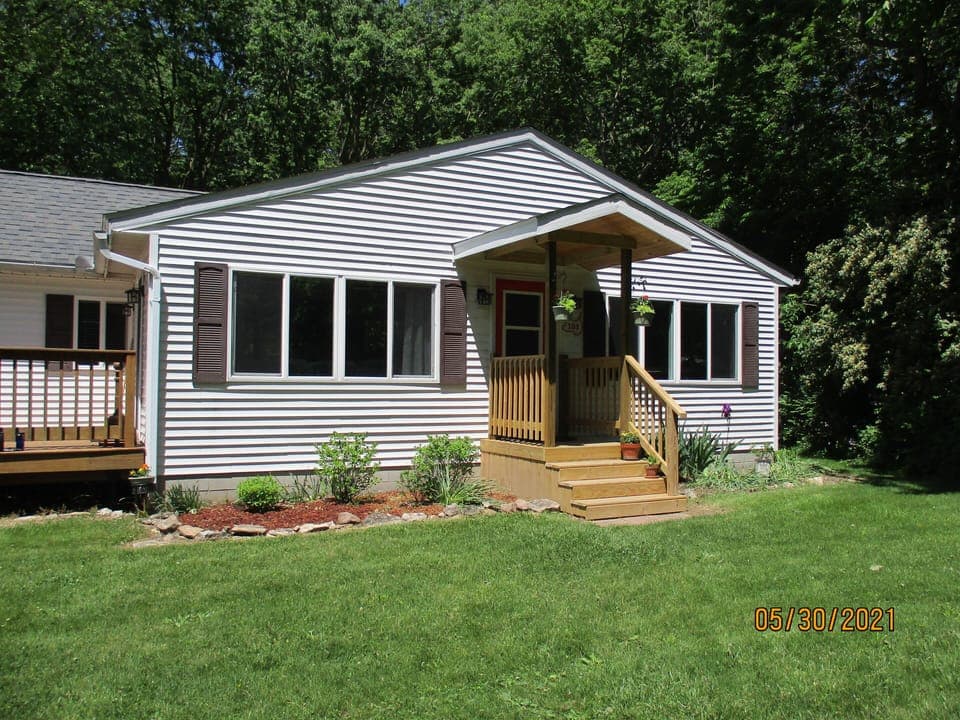 Look for the bright orange door!