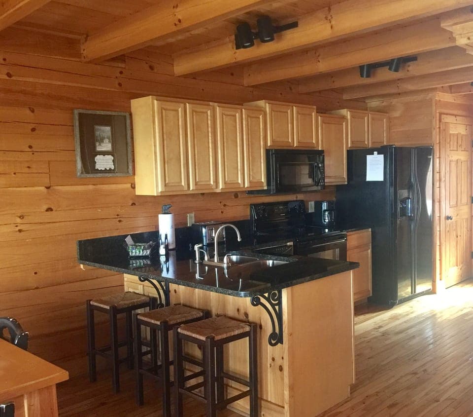 Fully Furnished Kitchen with Granite Countertops