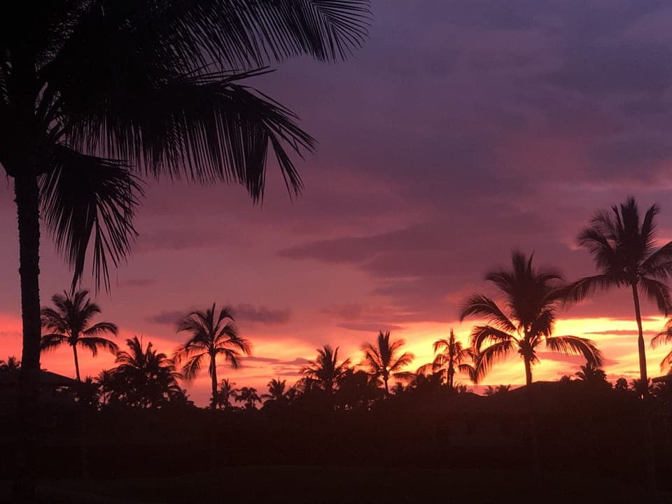 View the sun setting while sitting on the private lanai. 