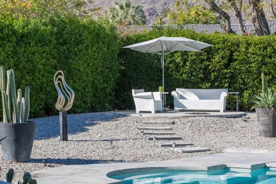 Backyard seating area w/fire pit.