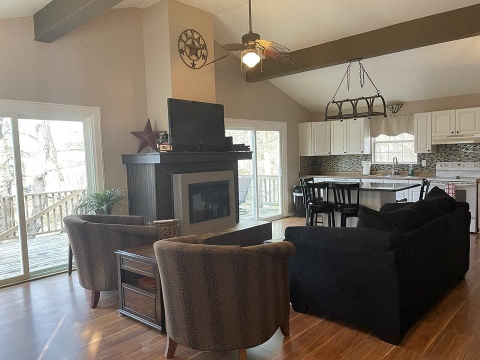 Open family room with comfortable sitting.  Sofa is a sleeper.