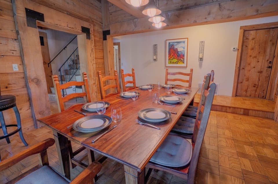 This beautifully appointed formal dining room provides seating for 10, ideal for large gatherings and festive dinners. With its elegant ambiance, it's perfect for creating lasting memories with friends and family