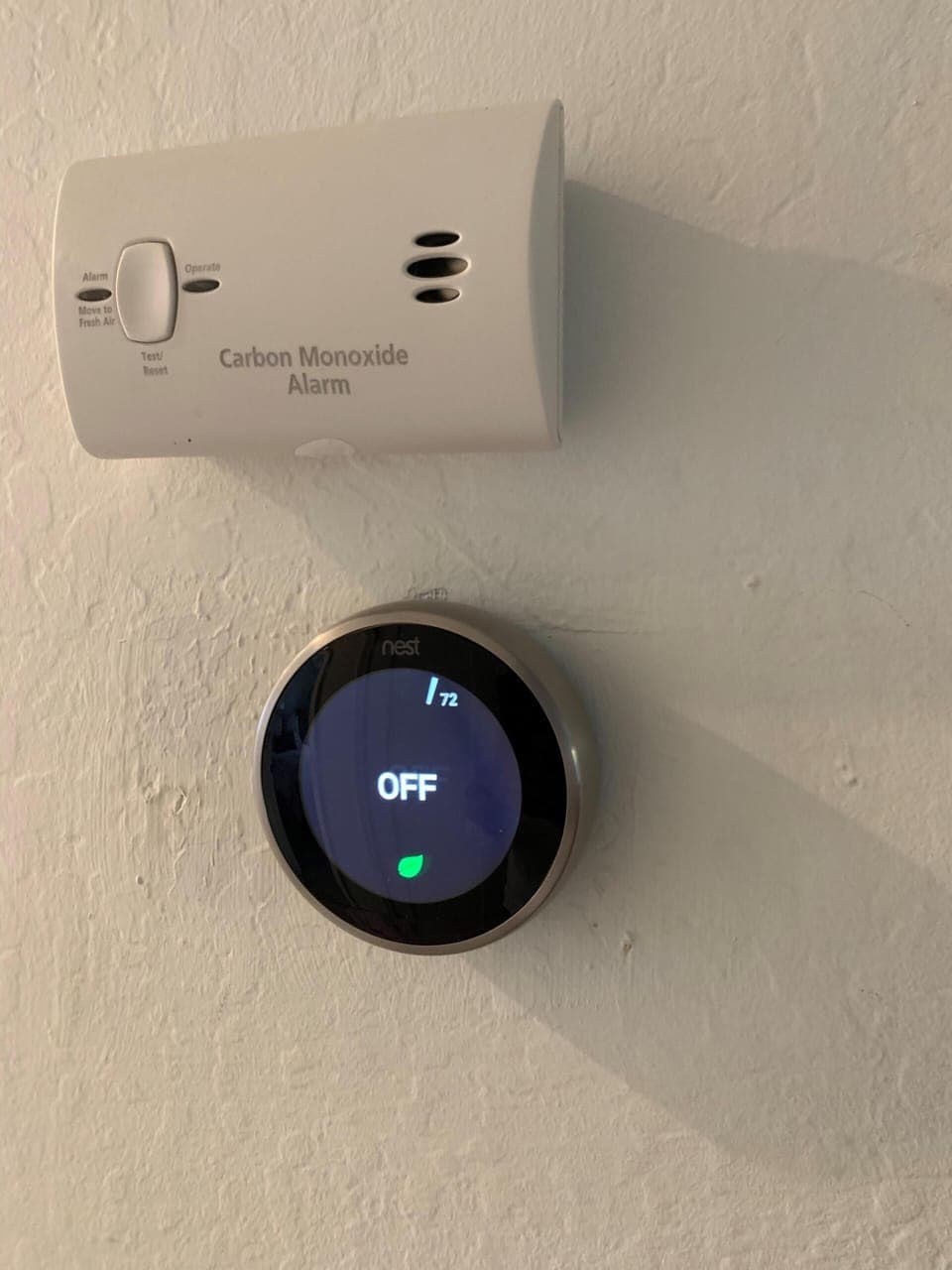 Nest thermostat for AC & Heat control + Carbon Monoxide alarm above it