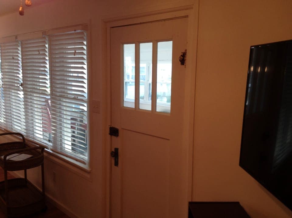 Door from living room to Sun Room