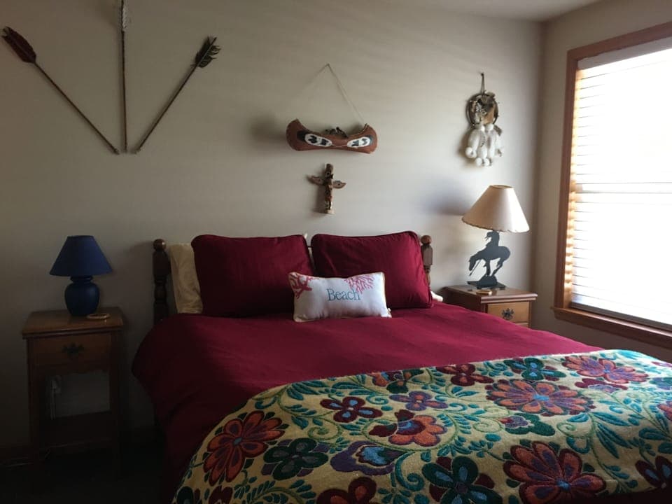 Queen bedroom on main floor. Across from separate vanity,shower,bath&toilet area