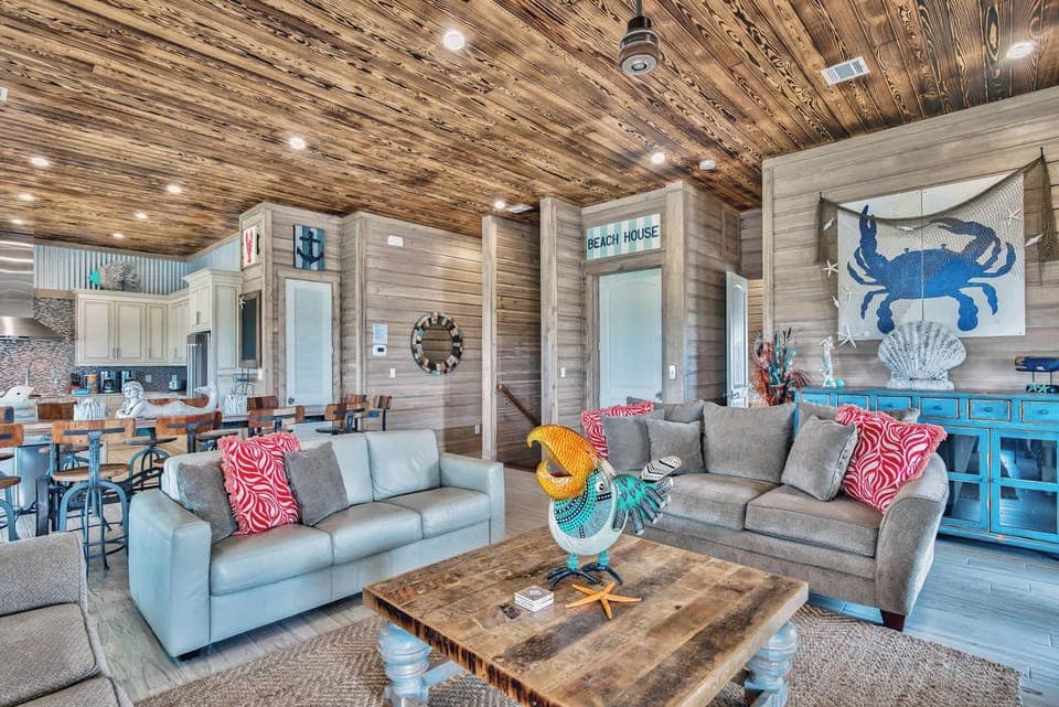 Spacious lounge w/ sectional sofas and warm textures designed for group relaxation