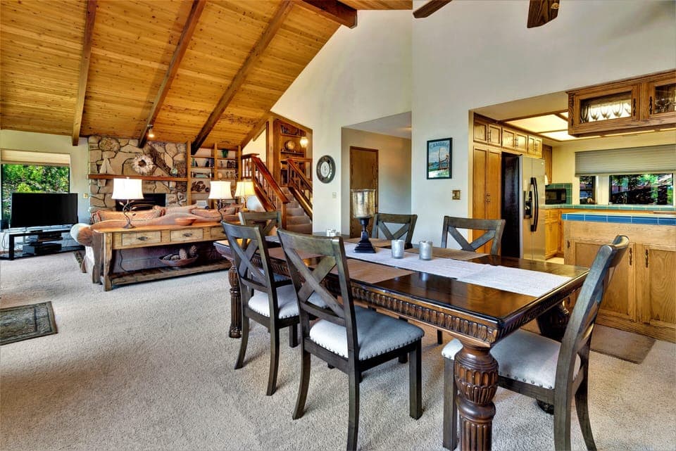 Open plan dining. To the left is French door to large deck w/ocean views.