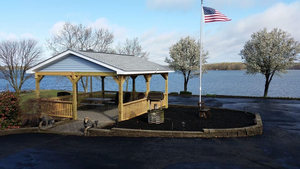 Pavilion and Flag  . .  both illuminated at night. 12 - 15 car parking lot.