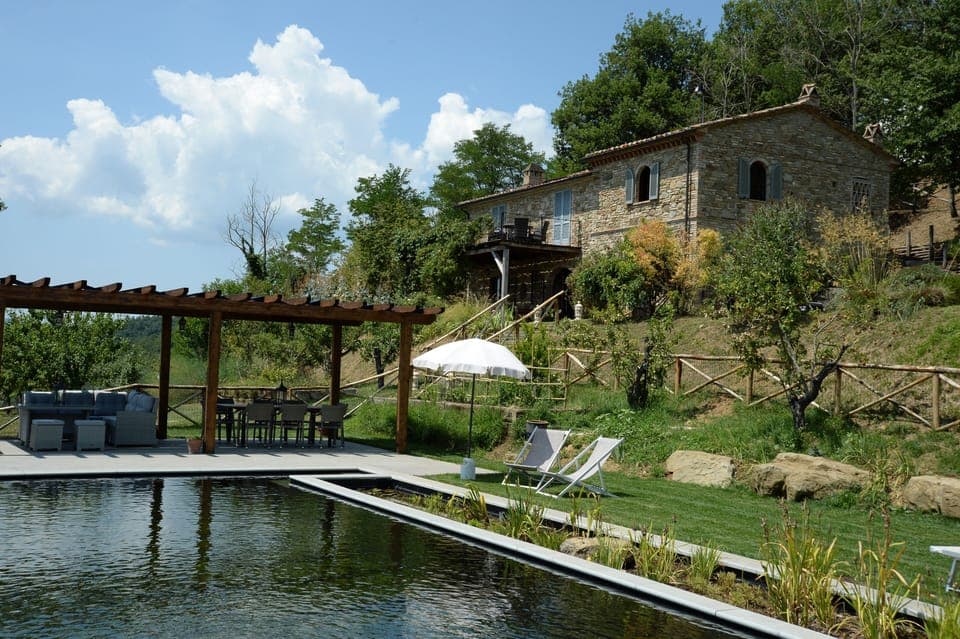 Casa dell'Ortolano (the Garden House) and its new bio-pool (added in 2019)