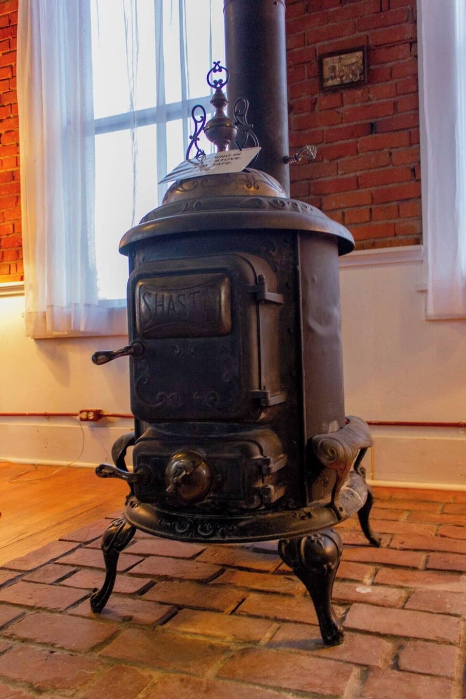 Original antique wood burning fireplace (non-functional)