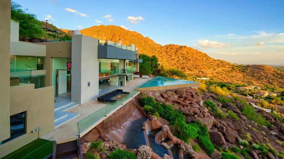 Sundown of Camelback Vista with incredible waterfall & pool view