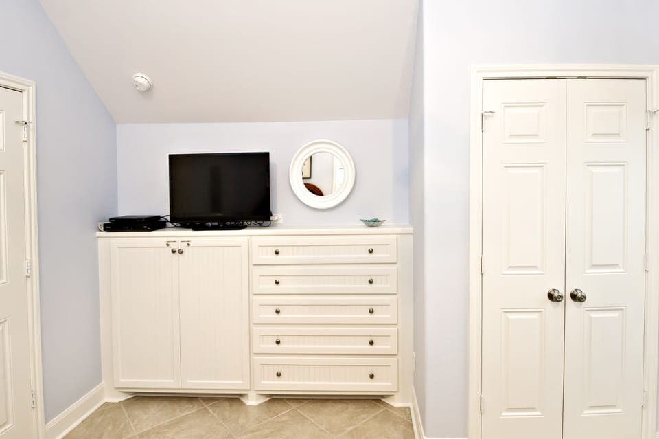 Twin Bedroom has 32" TV with DVD player and built in drawers