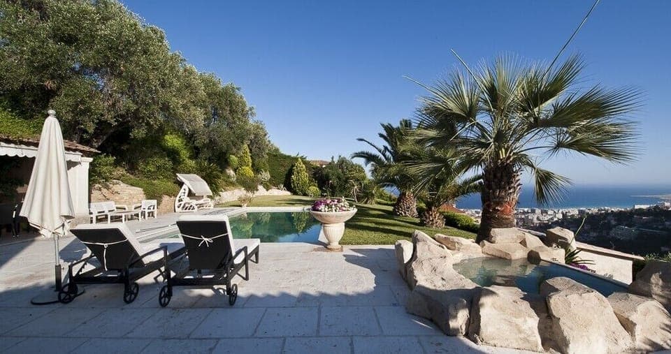 The terrace, pool, jacuzzi-spa and the ocean view