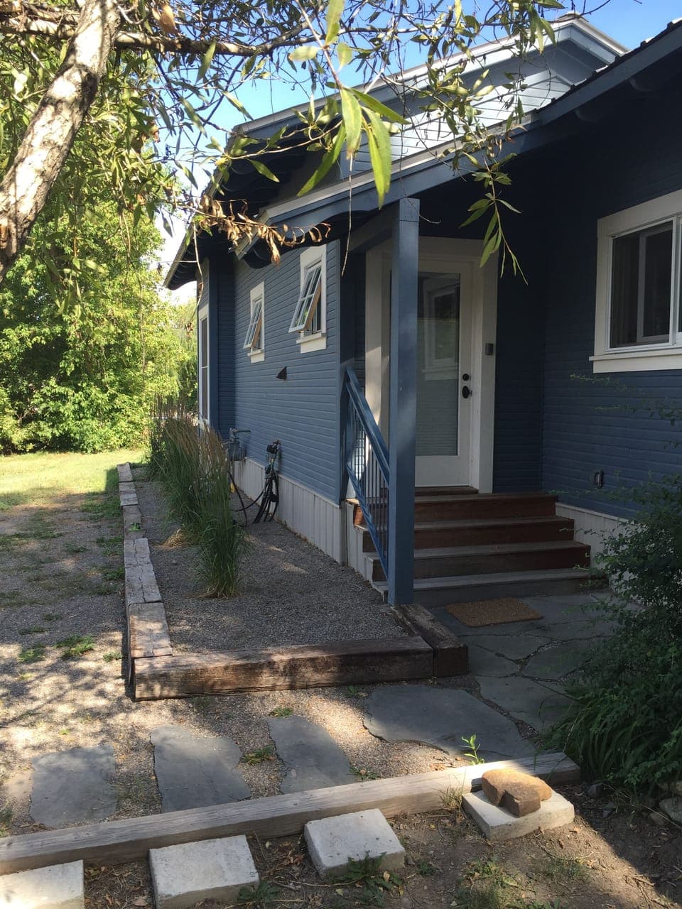side entrance, by driveway / off-street parking.