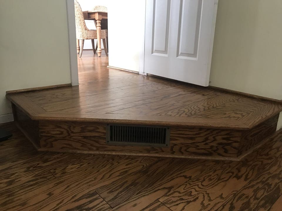 Small step down from dining area into master bedroom.