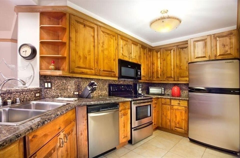 State of the art kitchen with large pass through to dining room and den. 
