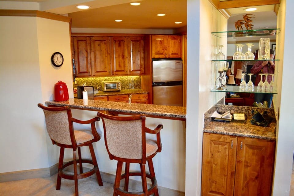 Updated kitchen with bar and bar stools for entertaining!