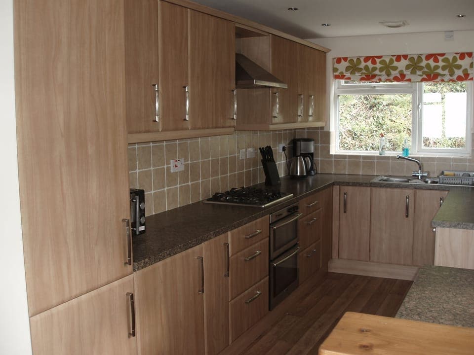 Integrated fridge-freezer, electric double oven and gas hob