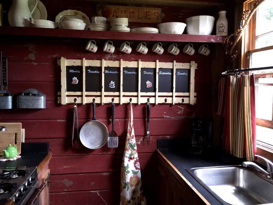 Partial galley kitchen view, ready for cooking and grilling.
