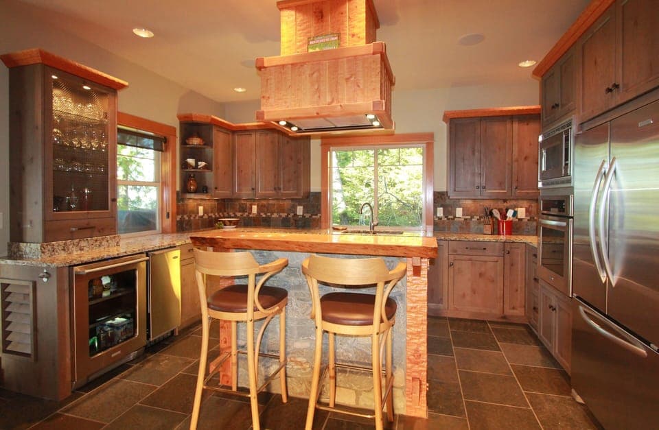 Kitchen has an added beverage fridge and under counter ice maker