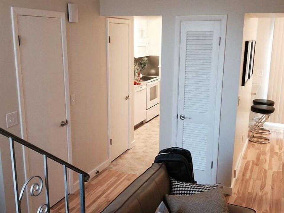 A pass-through makes communication between the kitchen and dining seamless