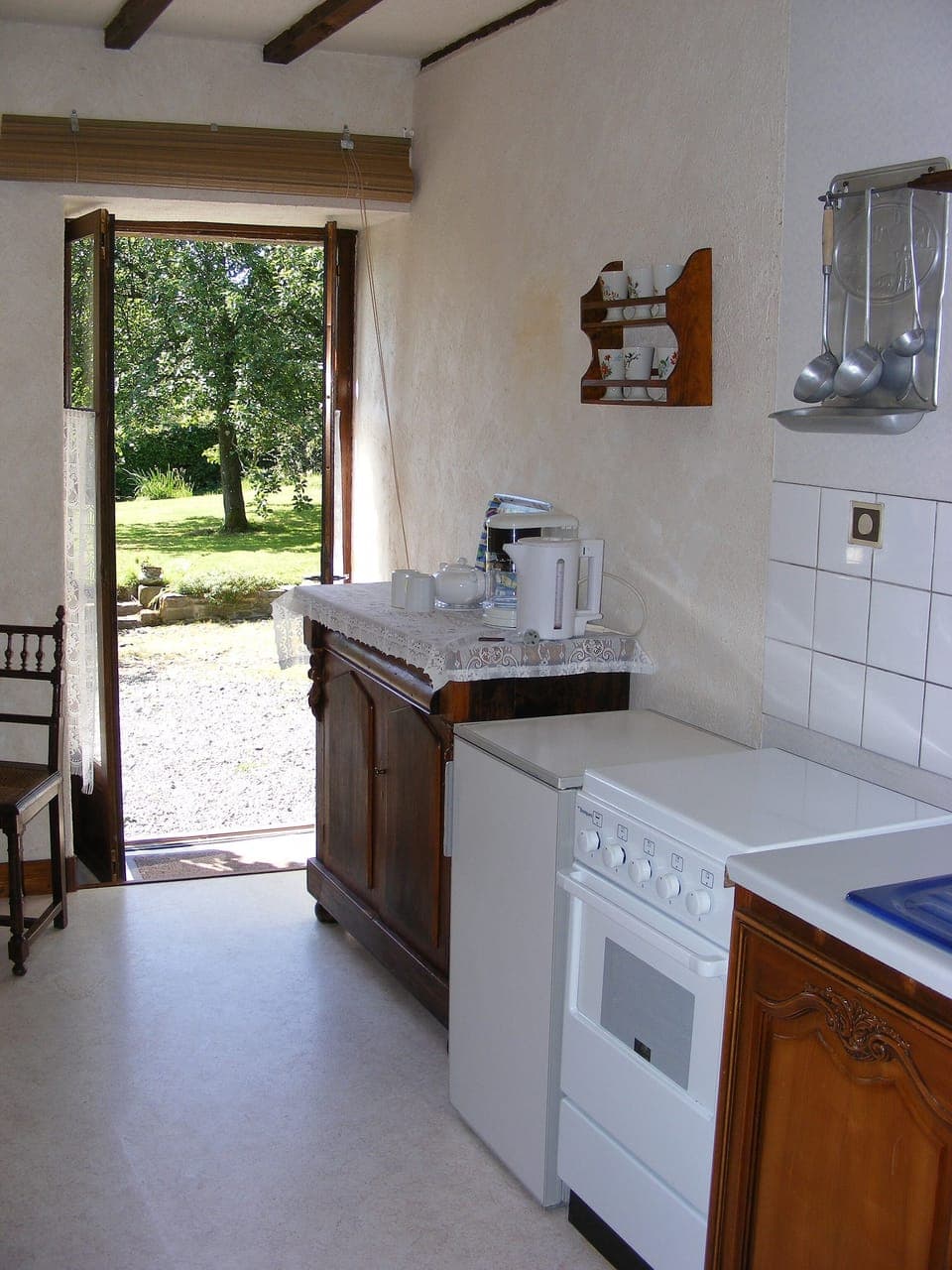 Look out over the garden whilst preparing a meal