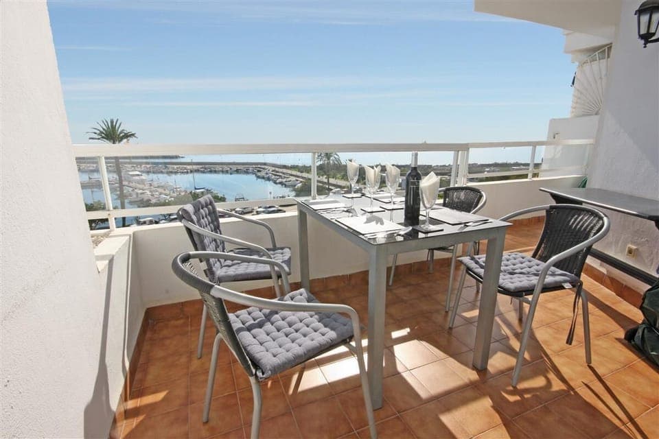 Outside balcony with great Mediterranean sea views over the harbour