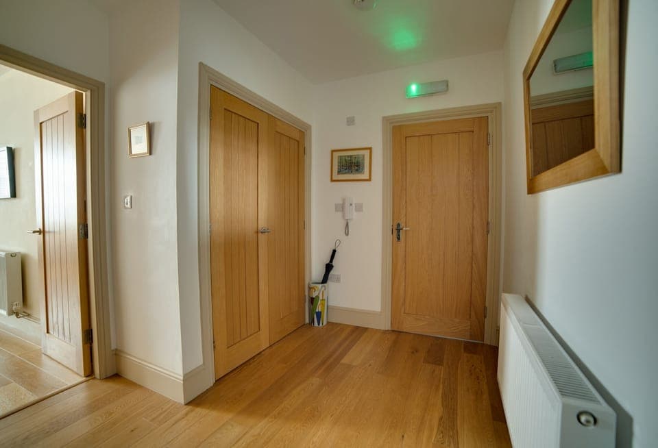 Spacious hallway with plenty of cupboard space. 