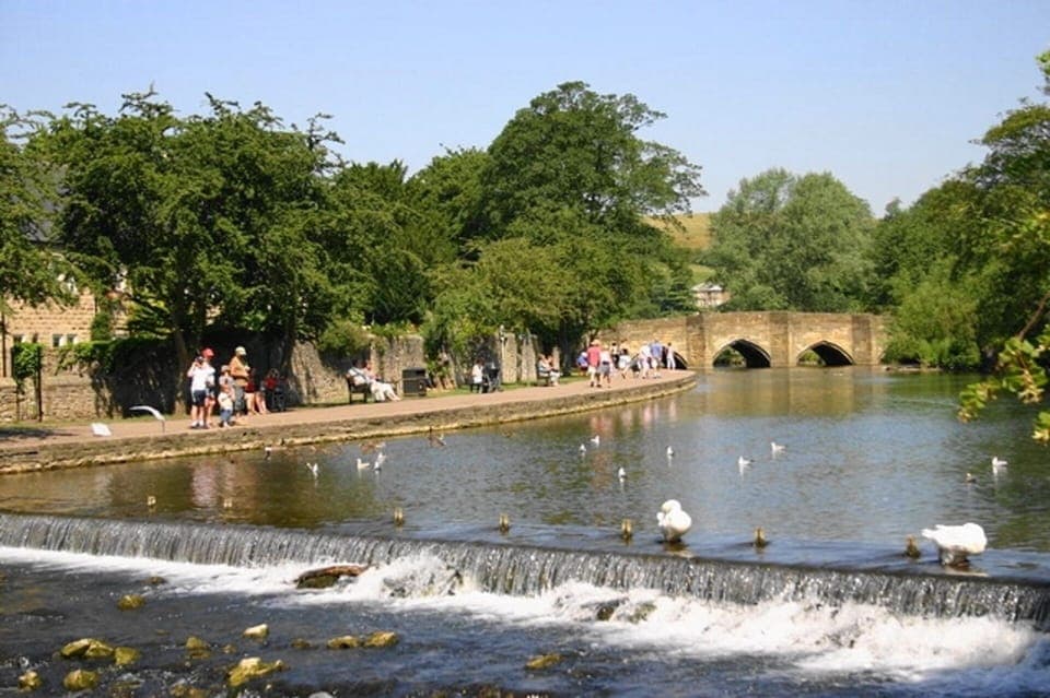 River Wye at the nearby market town of  Bakewell. Bakewell pudding is a MUST!
