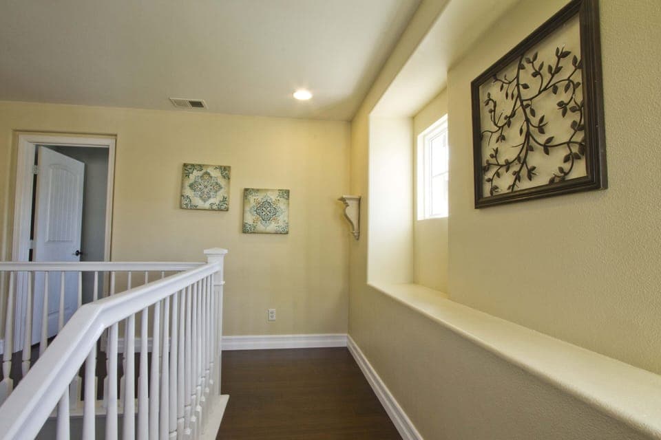 Upstairs Landing with  nice and clean solid surface flooring throughout