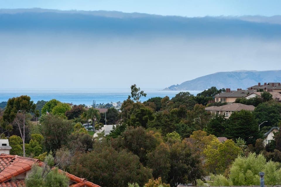 This property sits with unobstructed views, amazing sunsets & fab landscaping .