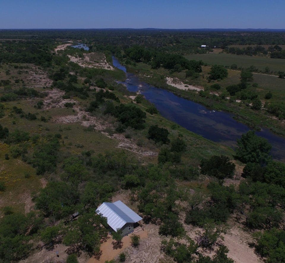 Cabin overlooks the Llano River.