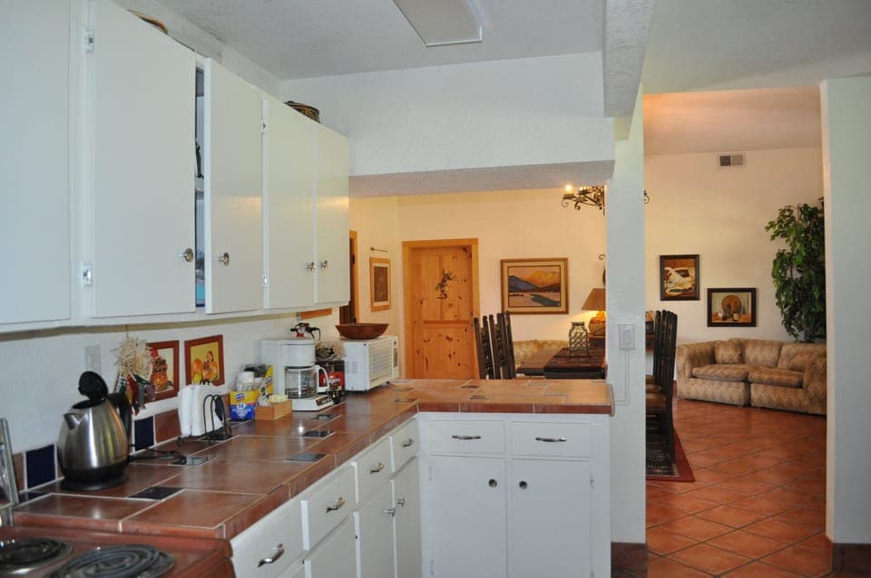 Full kitchen opens up to common area