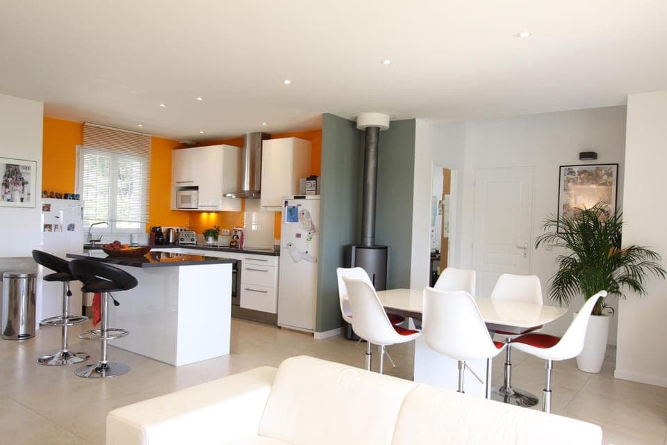 Fully equippe kitchen with large separate freezer (left) and fridge (right).