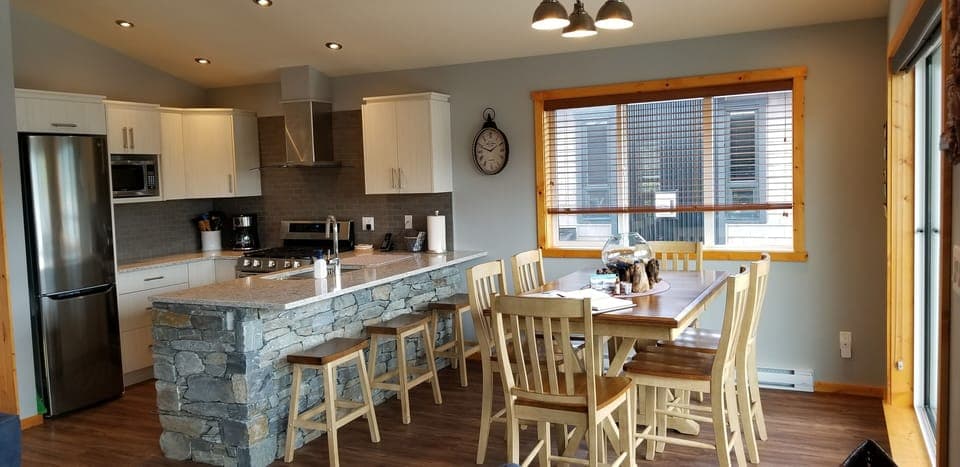 Kitchen and dining area with seating for up to 9