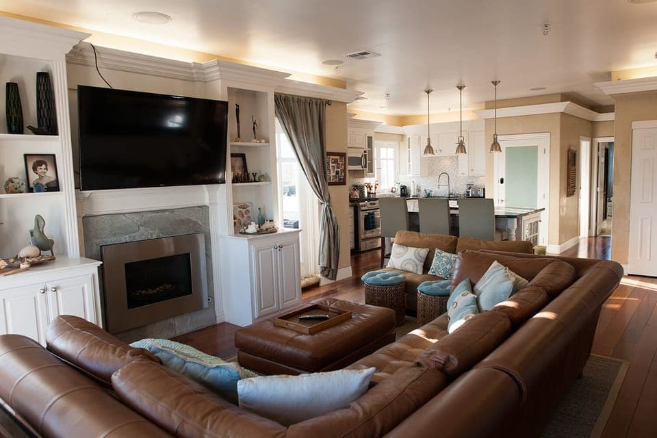 Left side of penthouses: spacious living room with connecting open kitchen.