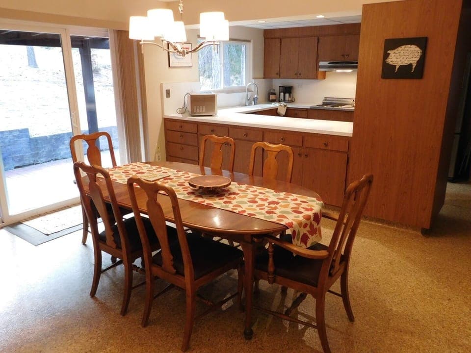 Dining room with seating for six.  Leaves expand for more room.